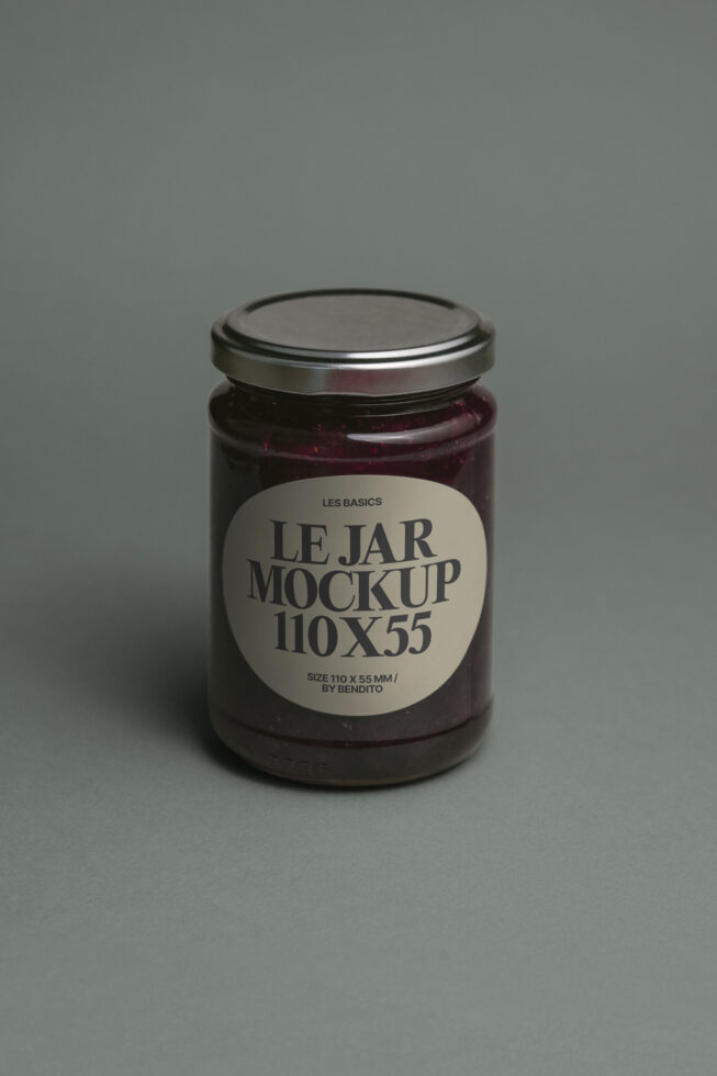 Dark glass jar with cream label reading Le Jar Mockup 110 x 55 on gray surface