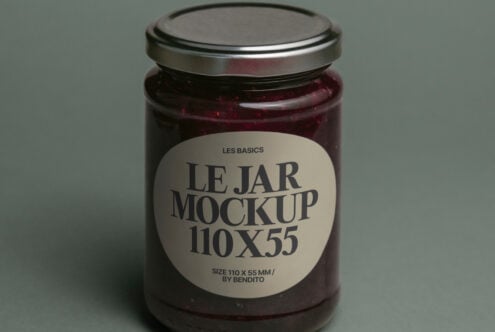 Burgundy preserve jar mockup with metallic cap on muted green background