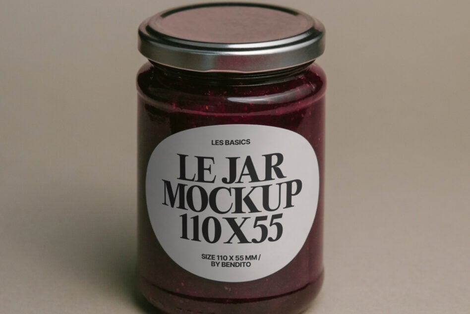 Maroon glass jar mockup with white label on neutral beige backdrop