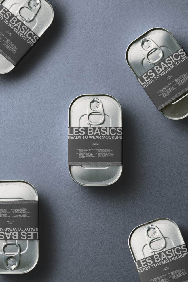 Five metallic cans scattered on blue surface with ready to wear mockups labels