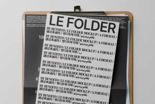 Clipboard with stacked papers showing multilingual folder mockup text repeating