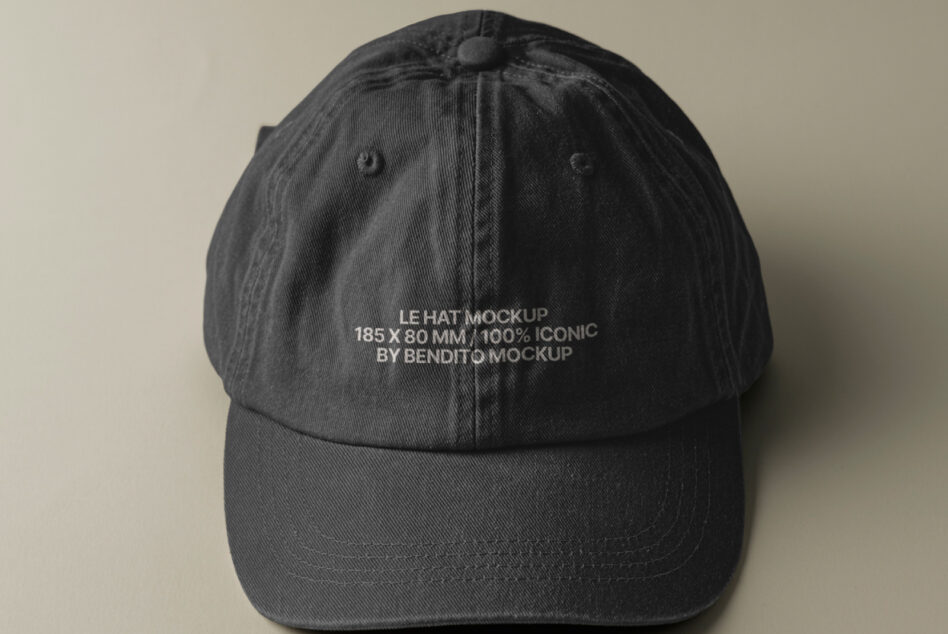 Dark gray cap from front showing embroidered text on crown area