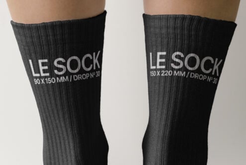 Black ribbed socks in different sizes displayed on feet
