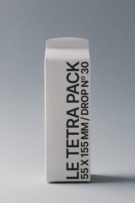 Off-white rectangular tetra pack mockup with vertical text layout