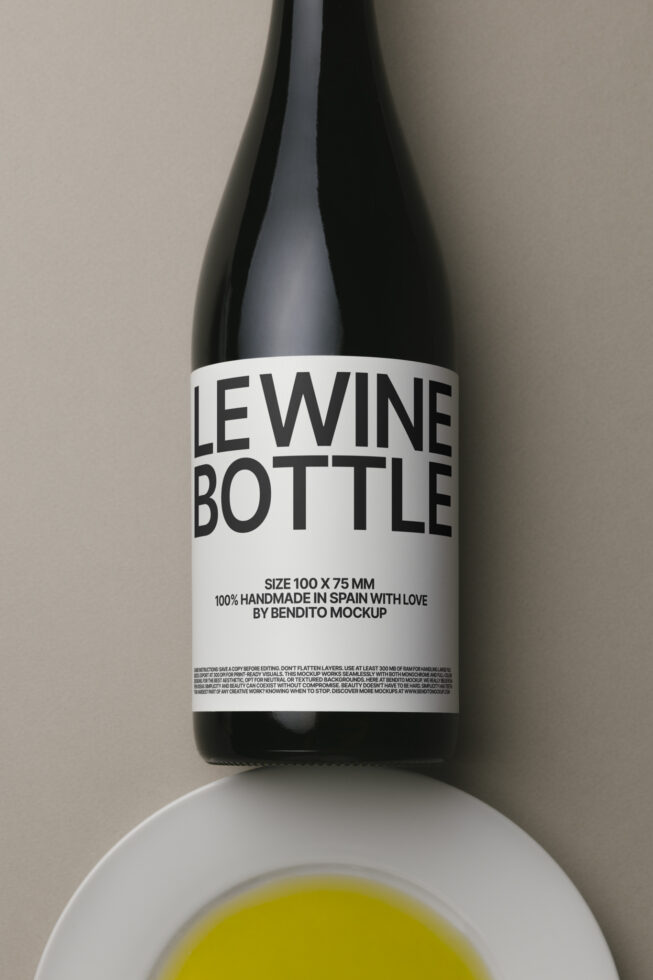 Clean wine bottle mockup with white label sat above yellow liquid in bowl
