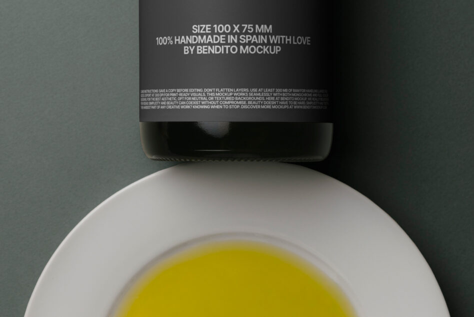 Close up of wine label showing small text details with liquid bowl underneath