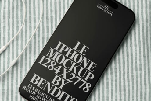 Black iPhone mockup on sage striped fabric with white cords nearby