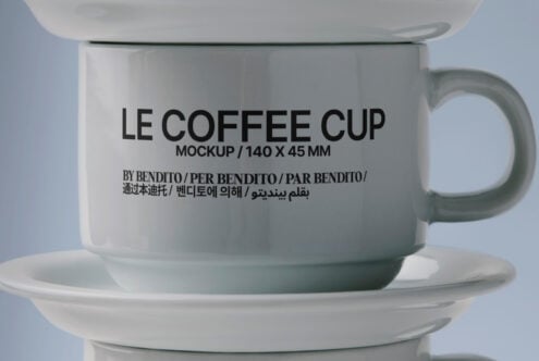 Single ceramic mug on saucer with Le Coffee Cup mockup text design visible
