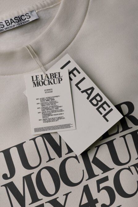 Label mockup on light fabric with white label tag showing care details