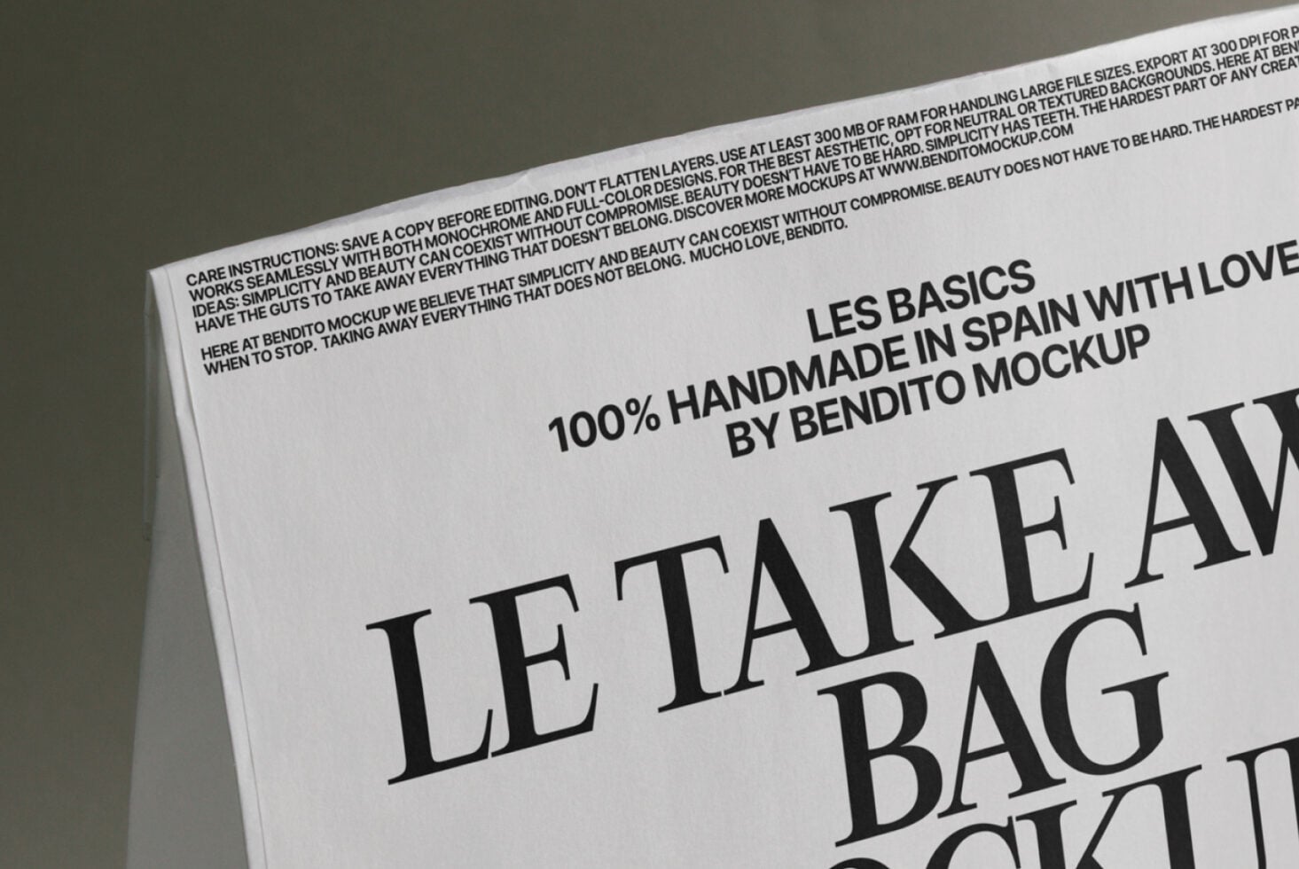 Close angled shot of folded bag mockup showing serif headline typography