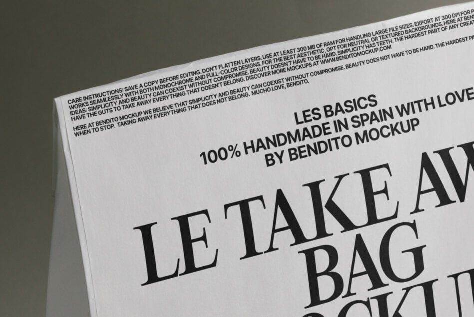 Close angled shot of folded bag mockup showing serif headline typography