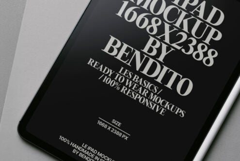 Close-up of dark iPad screen showing elegant serif font in white text