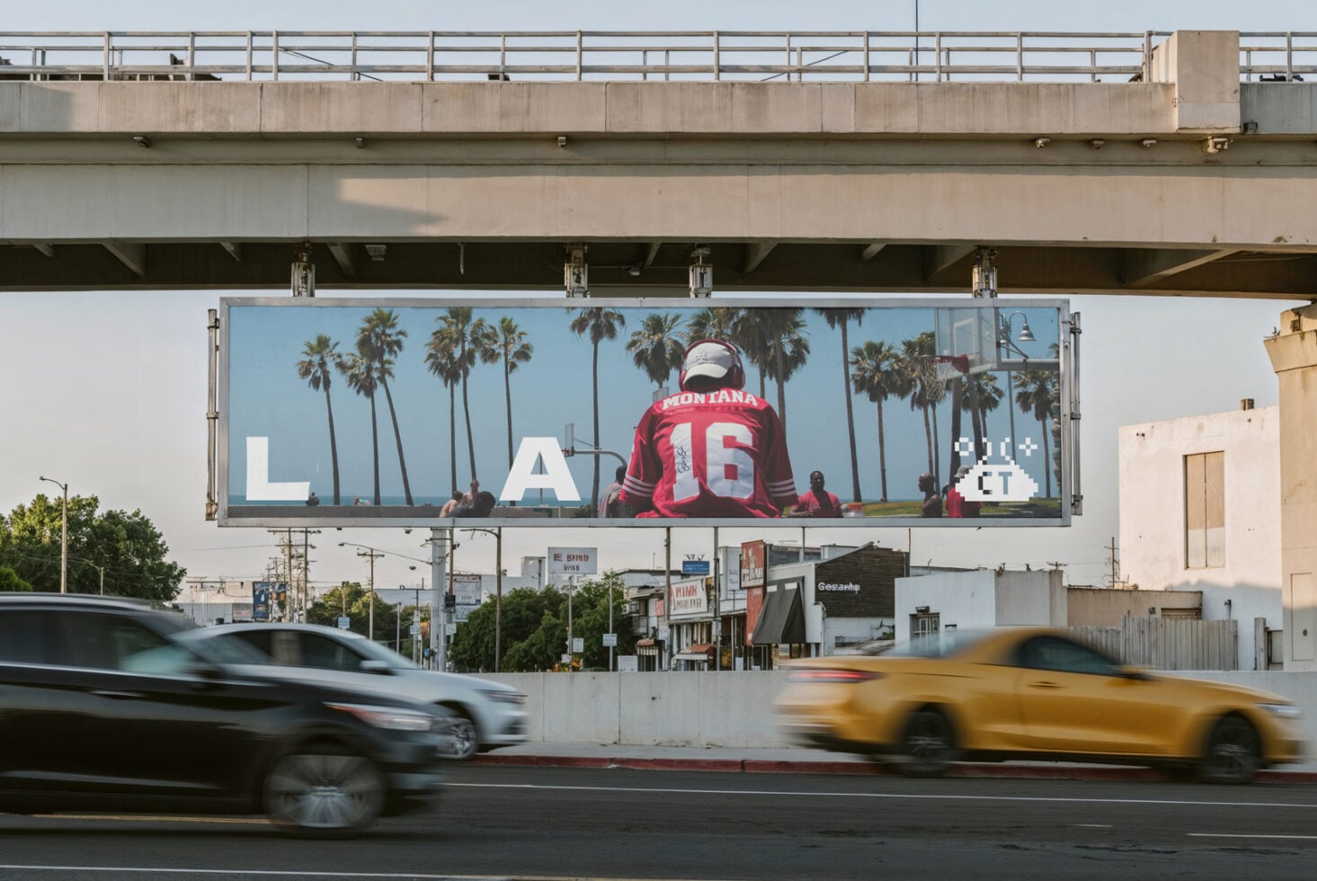 Freeway overpass billboard mockup with blank white space, LA text, traffic passing