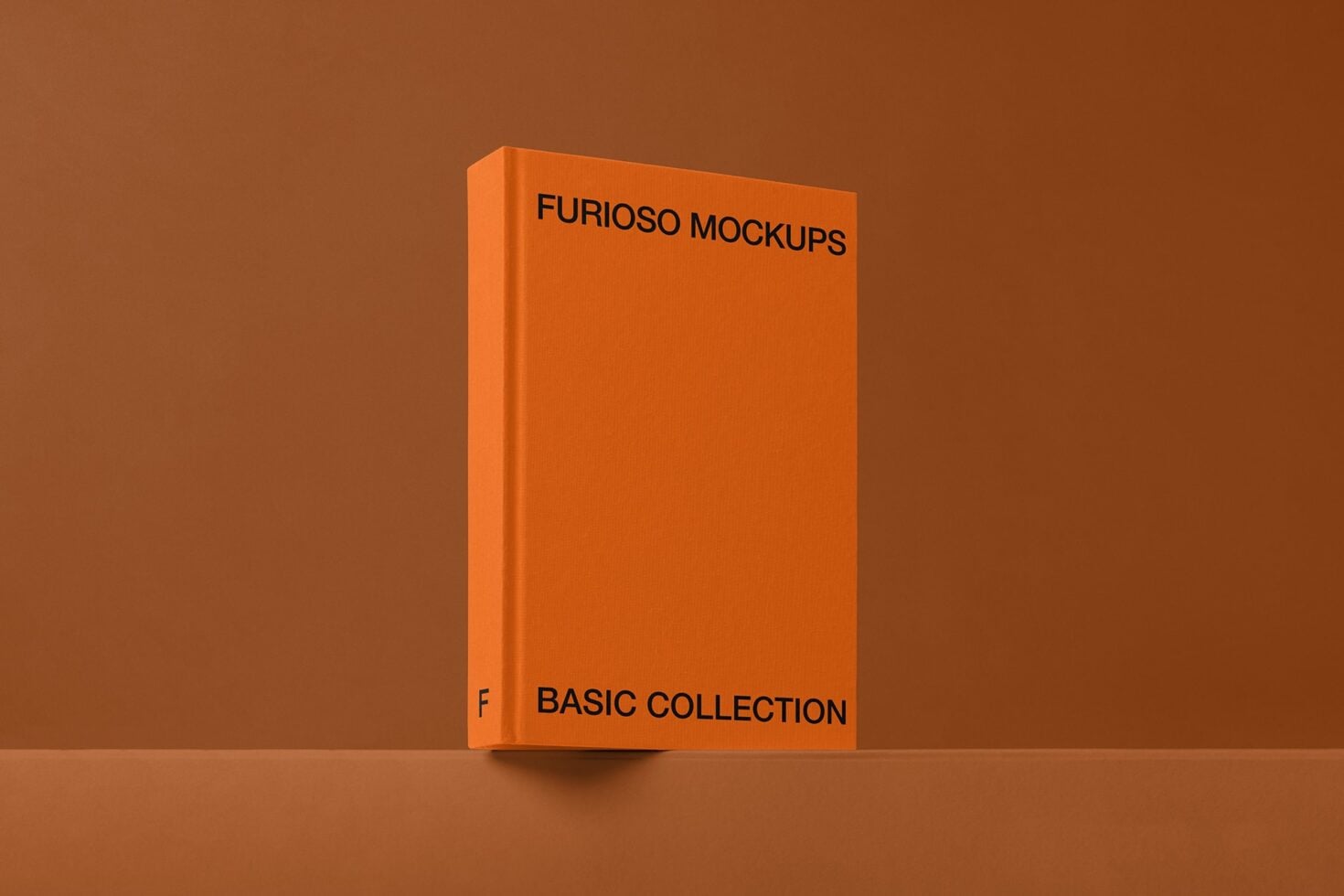 Bright orange box mockup standing upright on warm brown surface backdrop