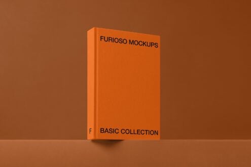 Bright orange box mockup standing upright on warm brown surface backdrop
