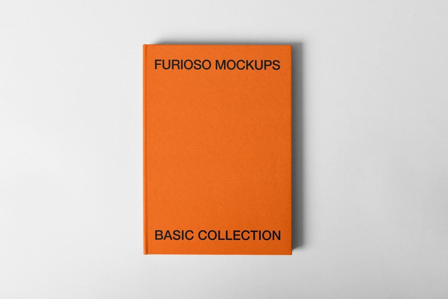 Orange hardcover book with Furioso Mockups Basic Collection title