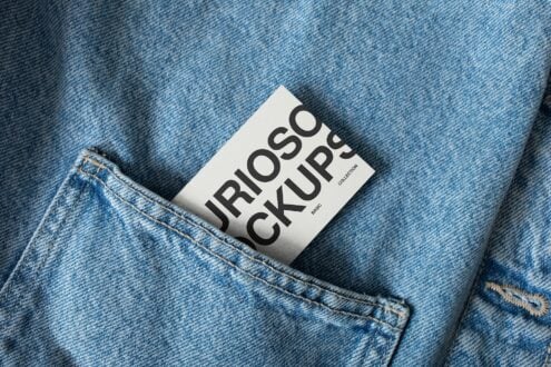 White tilted card in jeans pocket showing mockup layout