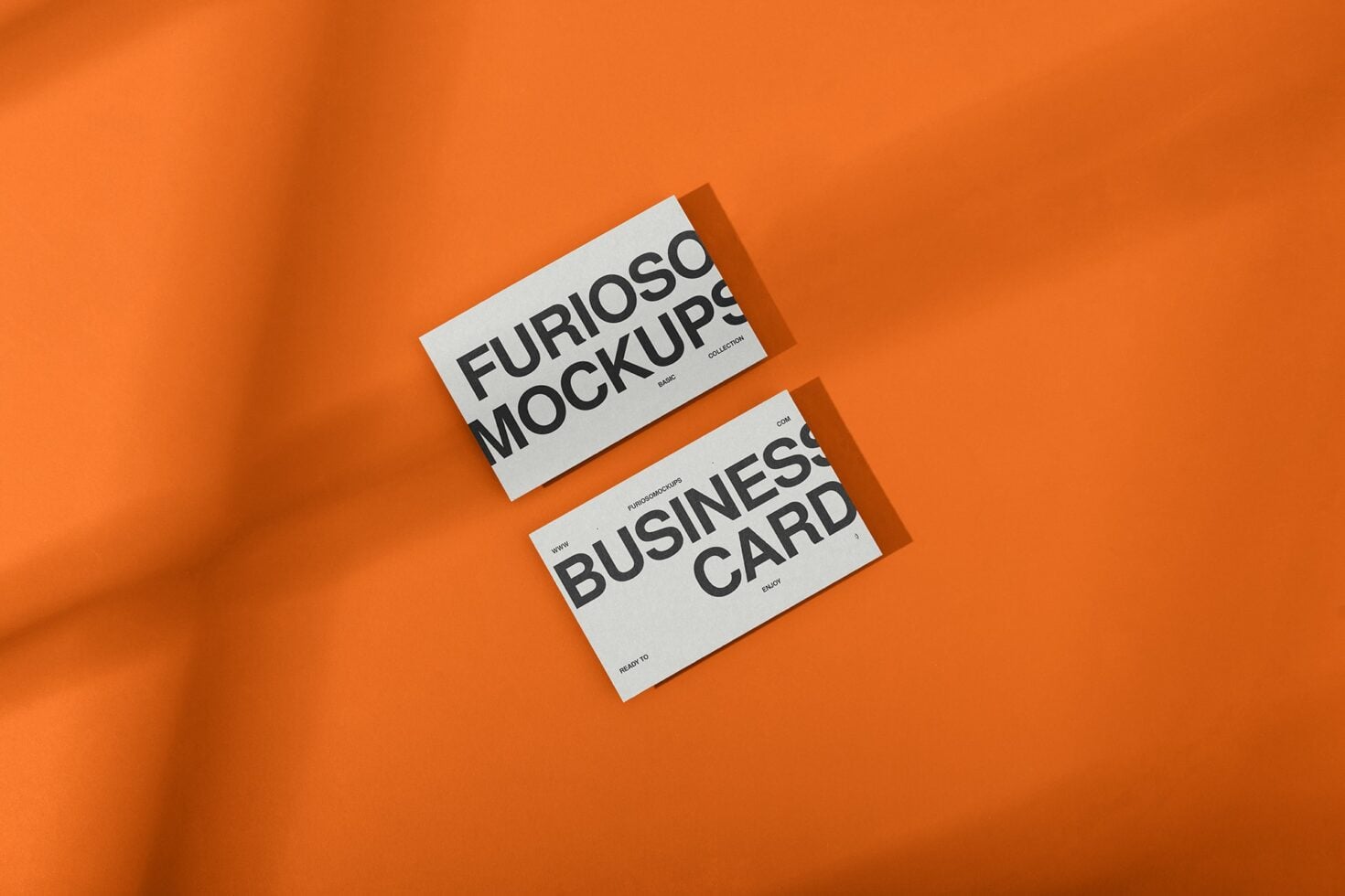 Orange business card mockup showing Furioso branding on vibrant background