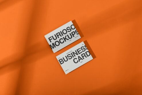 Orange business card mockup showing Furioso branding on vibrant background