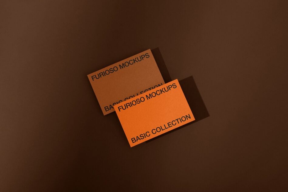 Stacked orange cards on brown background displaying Furioso Mockups Basic Collection with dramatic lighting
