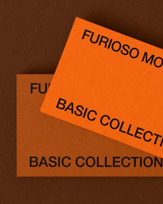 Overlapping orange brown paper with black text showing mockup titles stacked diagonally