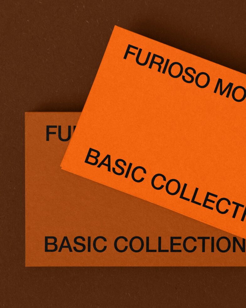 Overlapping orange brown paper with black text showing mockup titles stacked diagonally