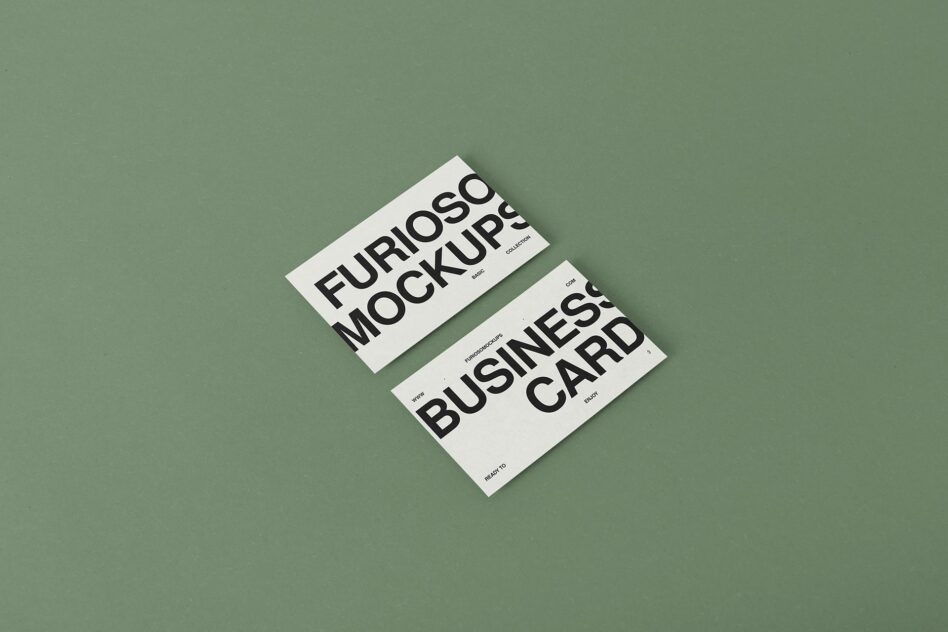 White stationery mockups arranged on muted green surface