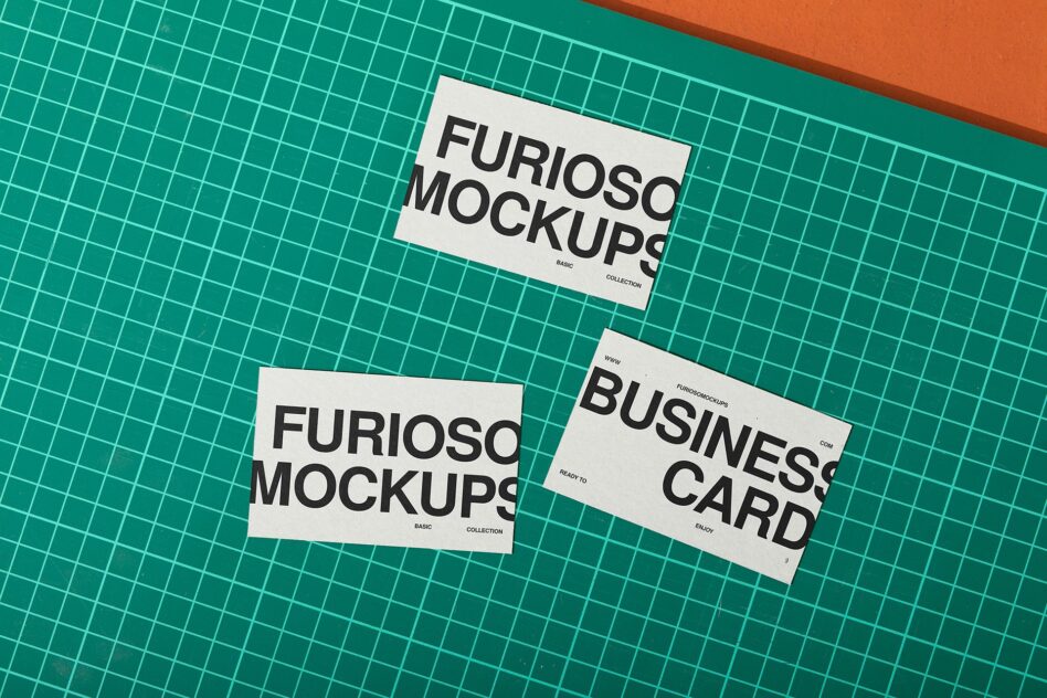 White stationery mockups spread on teal grid with business card