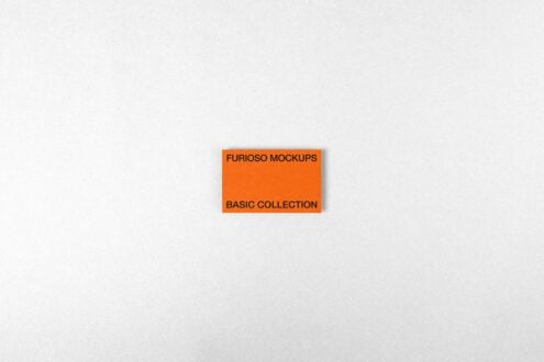 Single orange card with black typography on light gray background showing Furioso Mockups Basic Collection