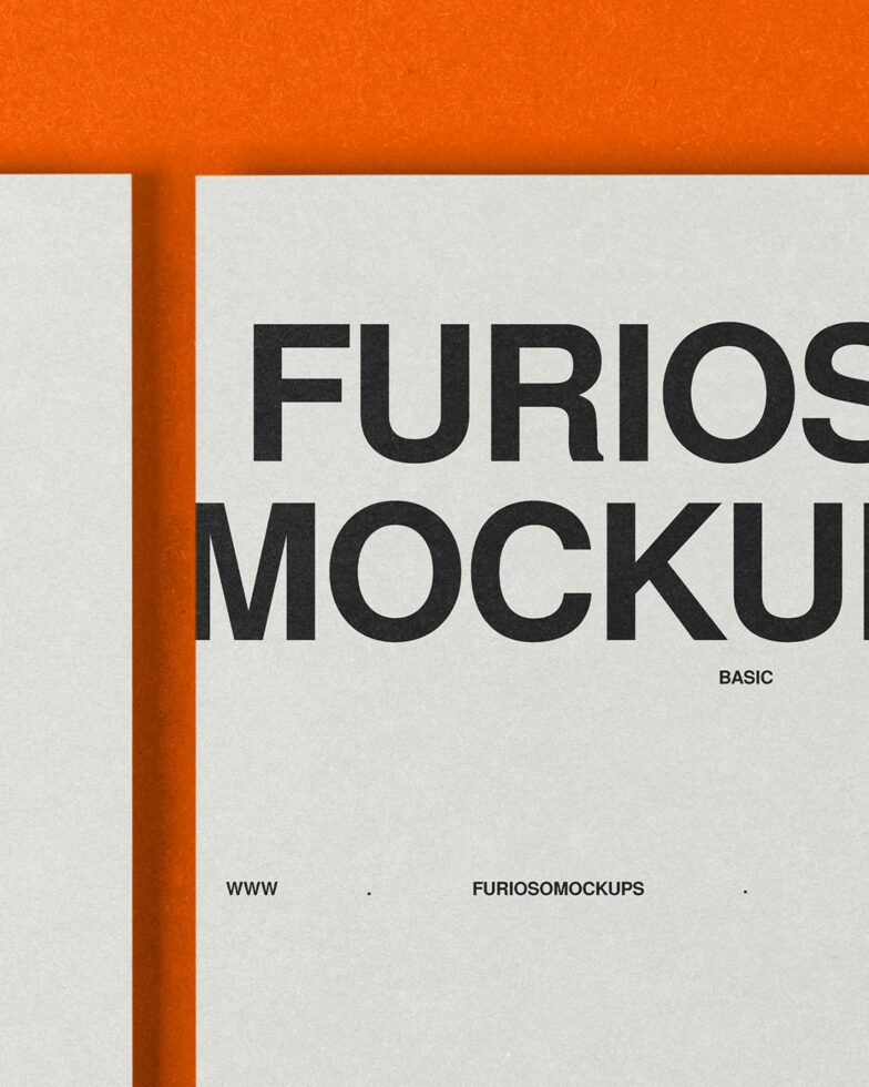 Close-up of printed material with orange edge binding showing Furioso Mockups text