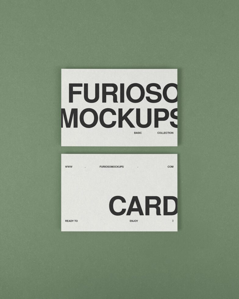 Two cream business cards stacked on sage green background with black typography