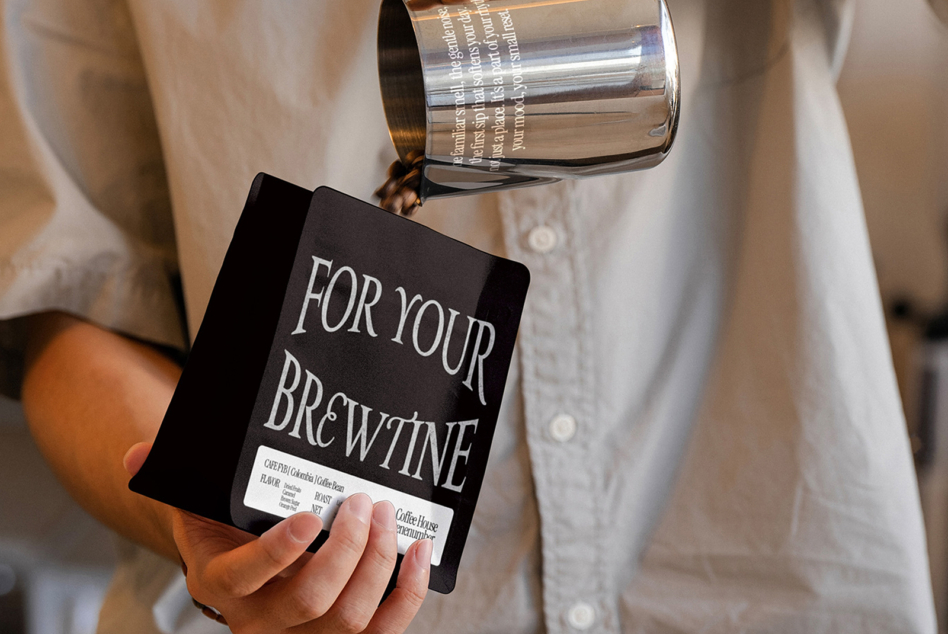 Black coffee bag mockup pouring into glass with silver canister overhead