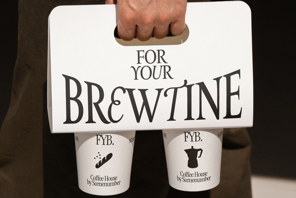 White coffee holder mockup displaying text layout with two branded coffee cups below