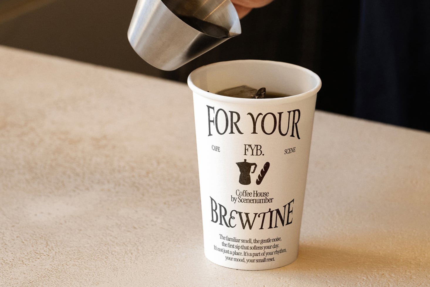 Gold striped coffee cup with For Your FYB Brewtine design, espresso being poured in