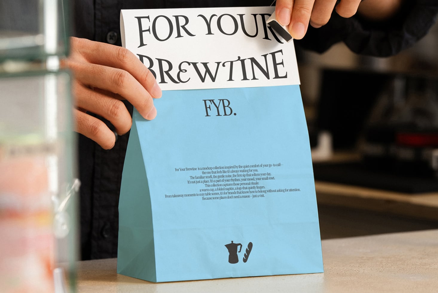 Blue folded coffee bag mockup with text layout, person holding displayed sample