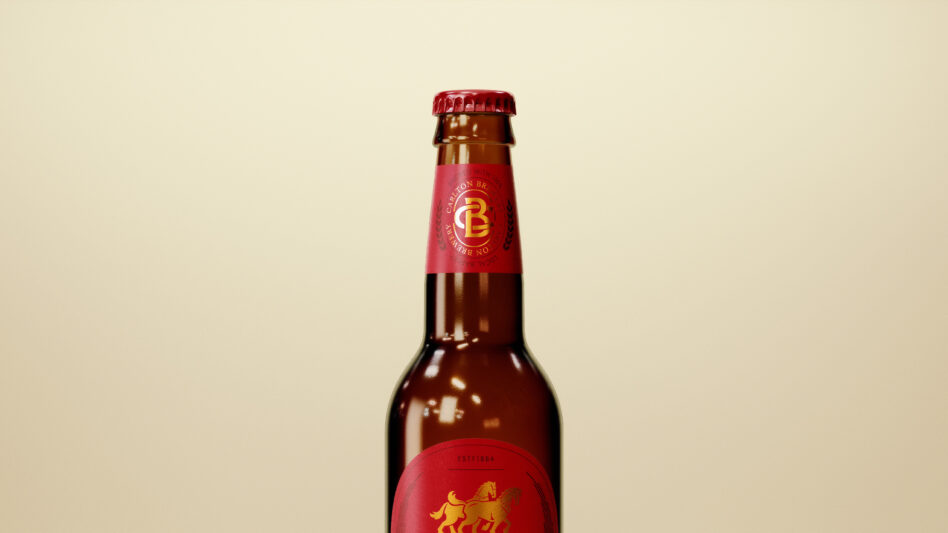 Carlton Draught bottle closeup on cream background showing label detail