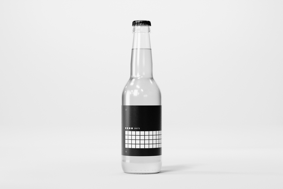 Clear glass beer bottle with black label mockup on white background