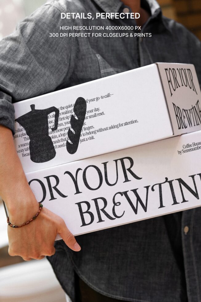 Open magazine spread with FOR YOUR BREW design, held in hands outdoors