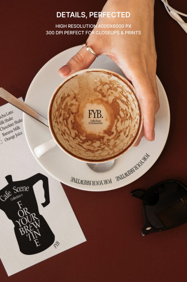 Overhead shot of latte cup with latte art, branding visible, high res closeup