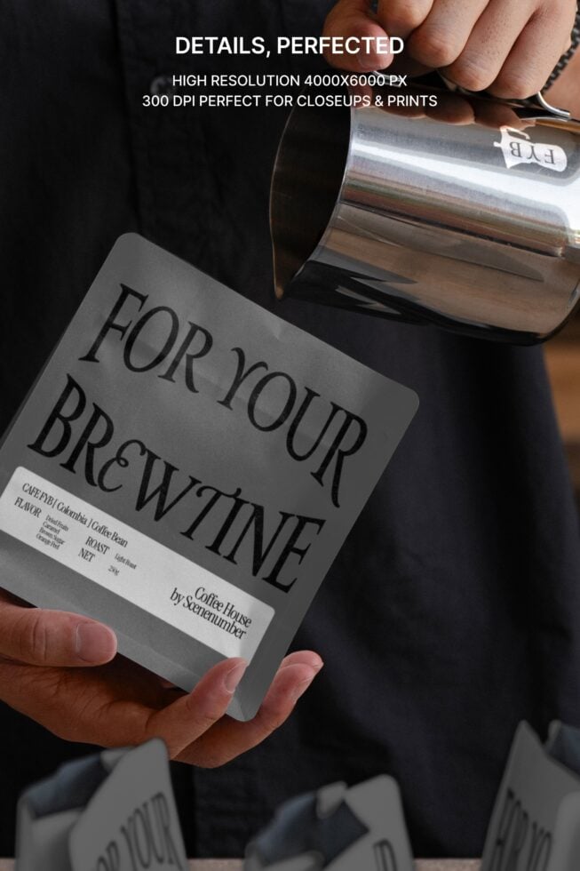 Close-up of hands holding coffee bag while pouring from shiny metal pitcher overhead