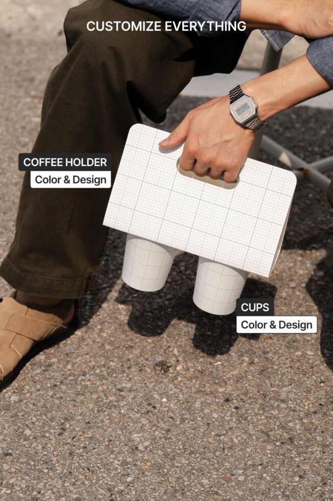 Person holding grid coffee holder with two branded cups below, ready to edit colors