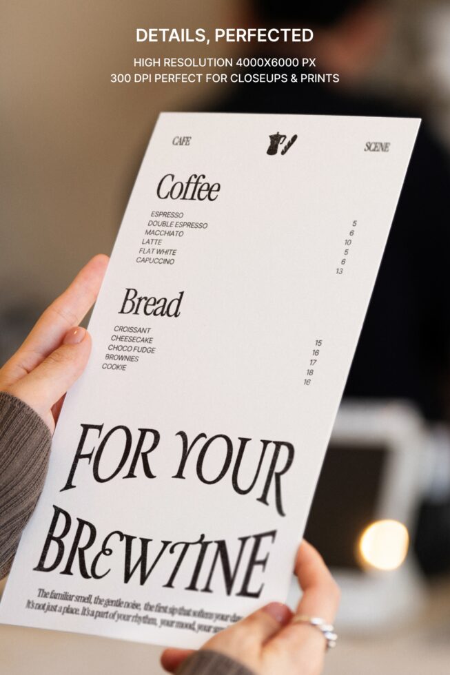 Hand holding single-page menu with coffee, bread items, for your brewntime