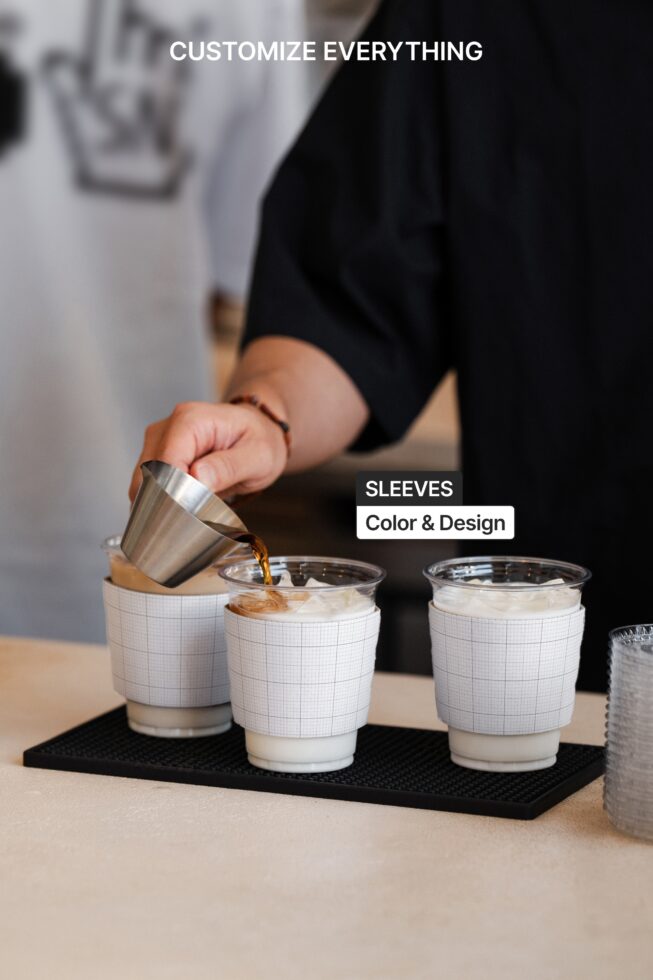 Barista pouring espresso into cup with grid-pattern sleeve mockup, three cups displayed
