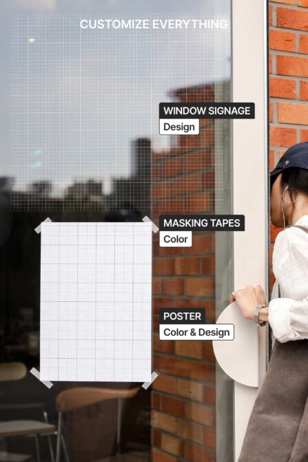 Window mockup with blank poster held up against brick storefront background
