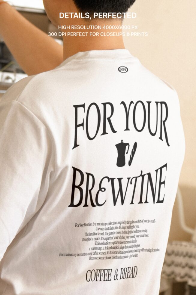 Back view of person wearing cream t-shirt with brewing-themed graphic text on back