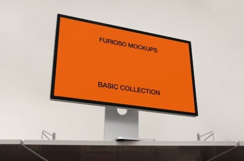 Monitor screen displaying orange banner, desk setup mockup