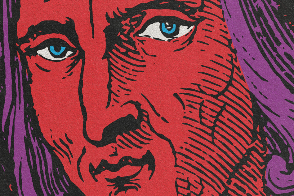 Red faced male portrait with purple hair blue eye close up