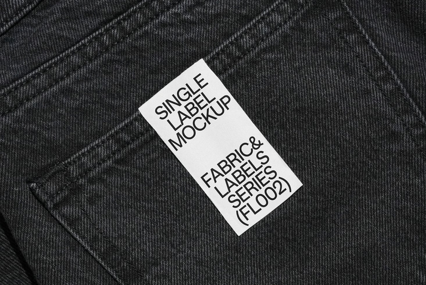 White woven label on charcoal fabric showing Single Label Mockup layout