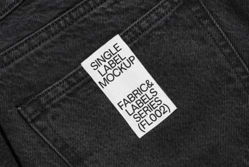 White woven label on charcoal fabric showing Single Label Mockup layout