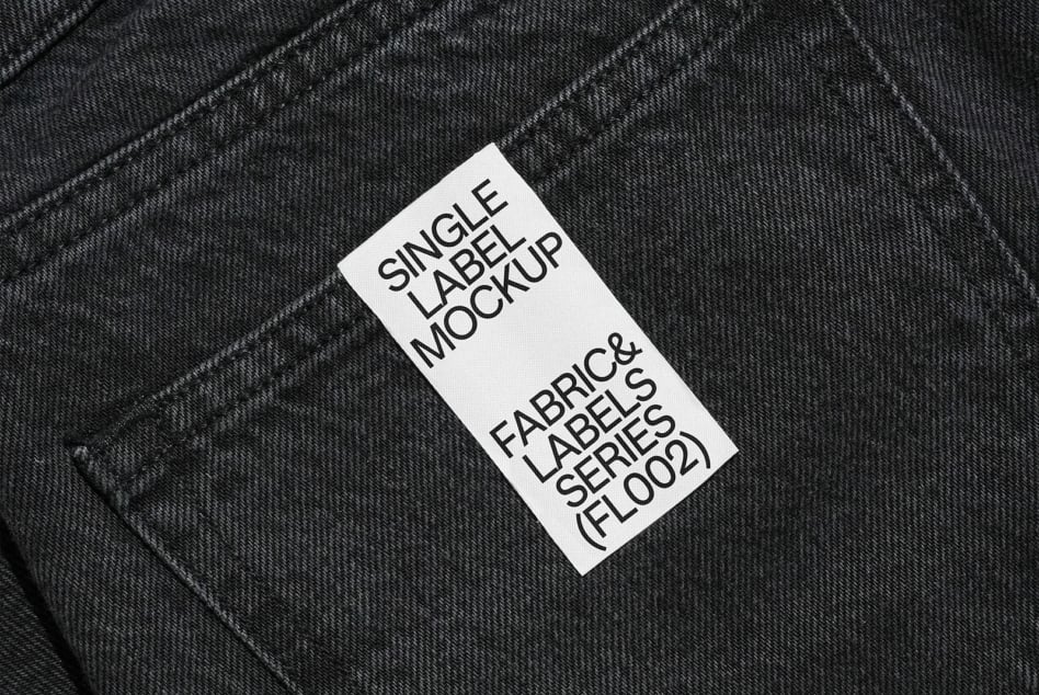 White woven label on charcoal fabric showing Single Label Mockup layout
